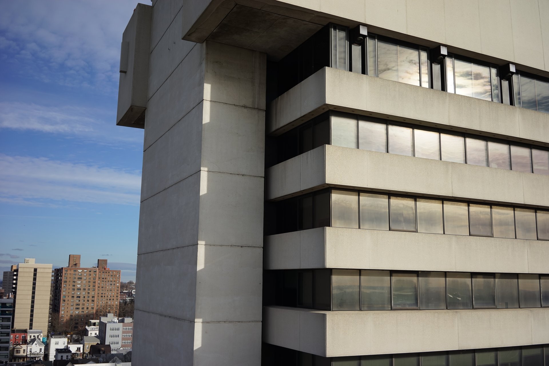 Drone view of Journal Square Tower corner facade in Jersey City, NJ